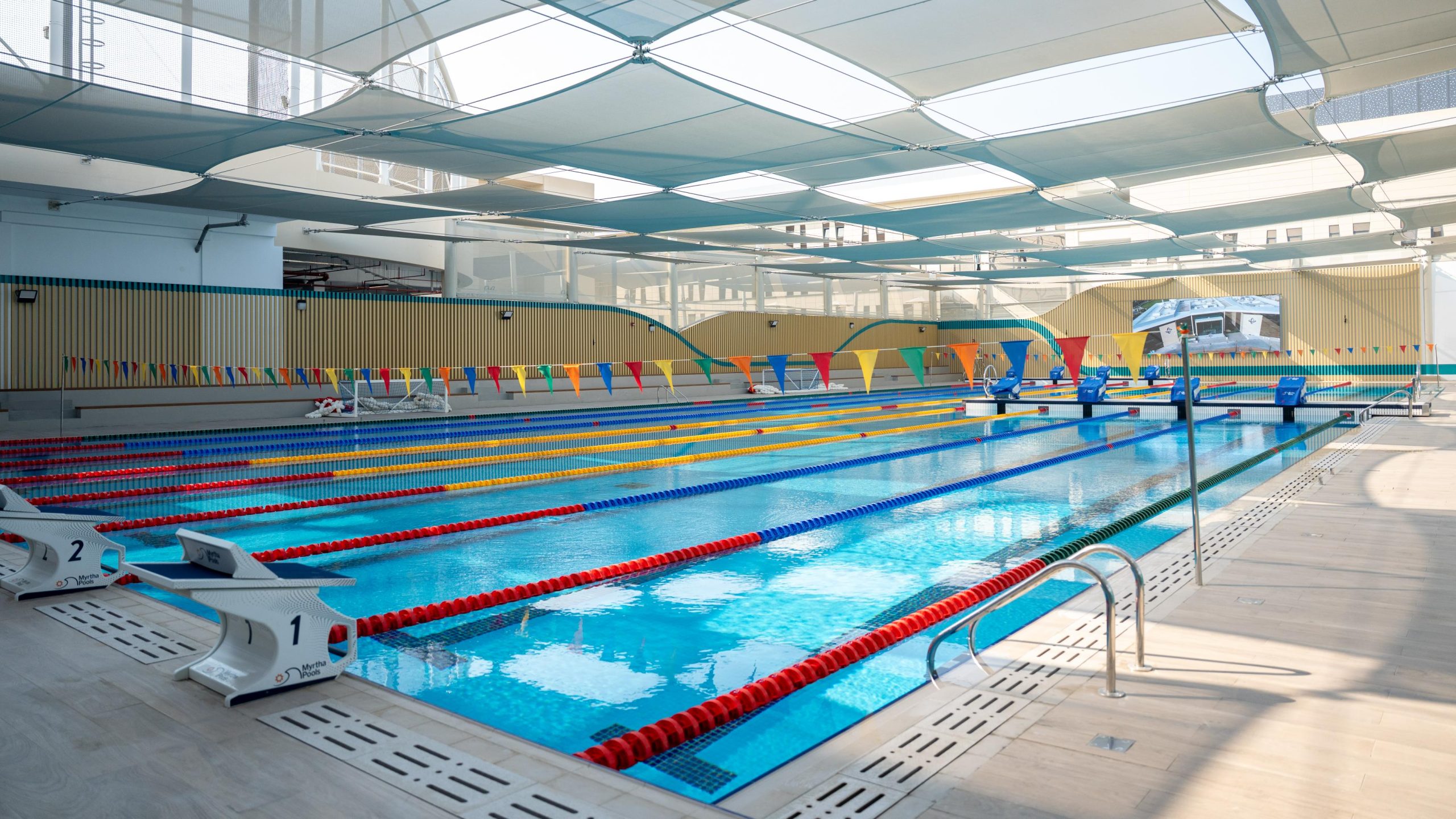 Students training in Olympic-standard sports facilities at GEMS SRI