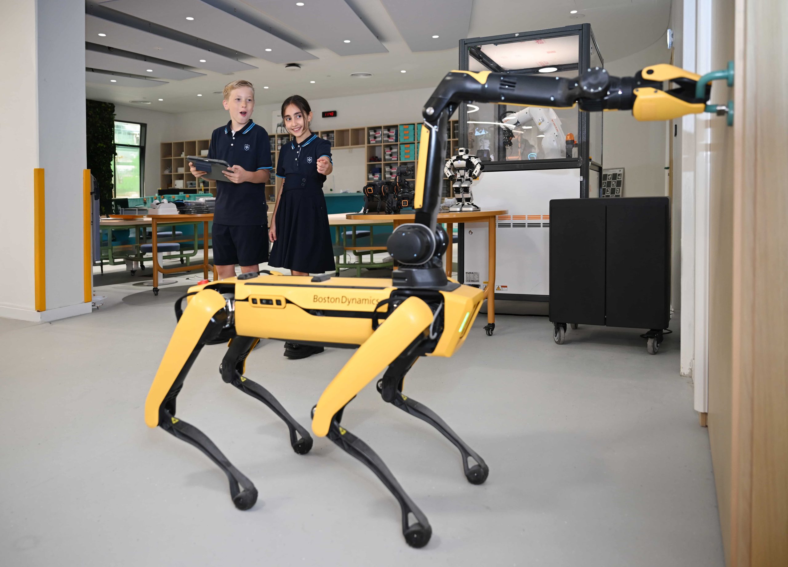 Students collaborating with industry technology partners in SRI labs