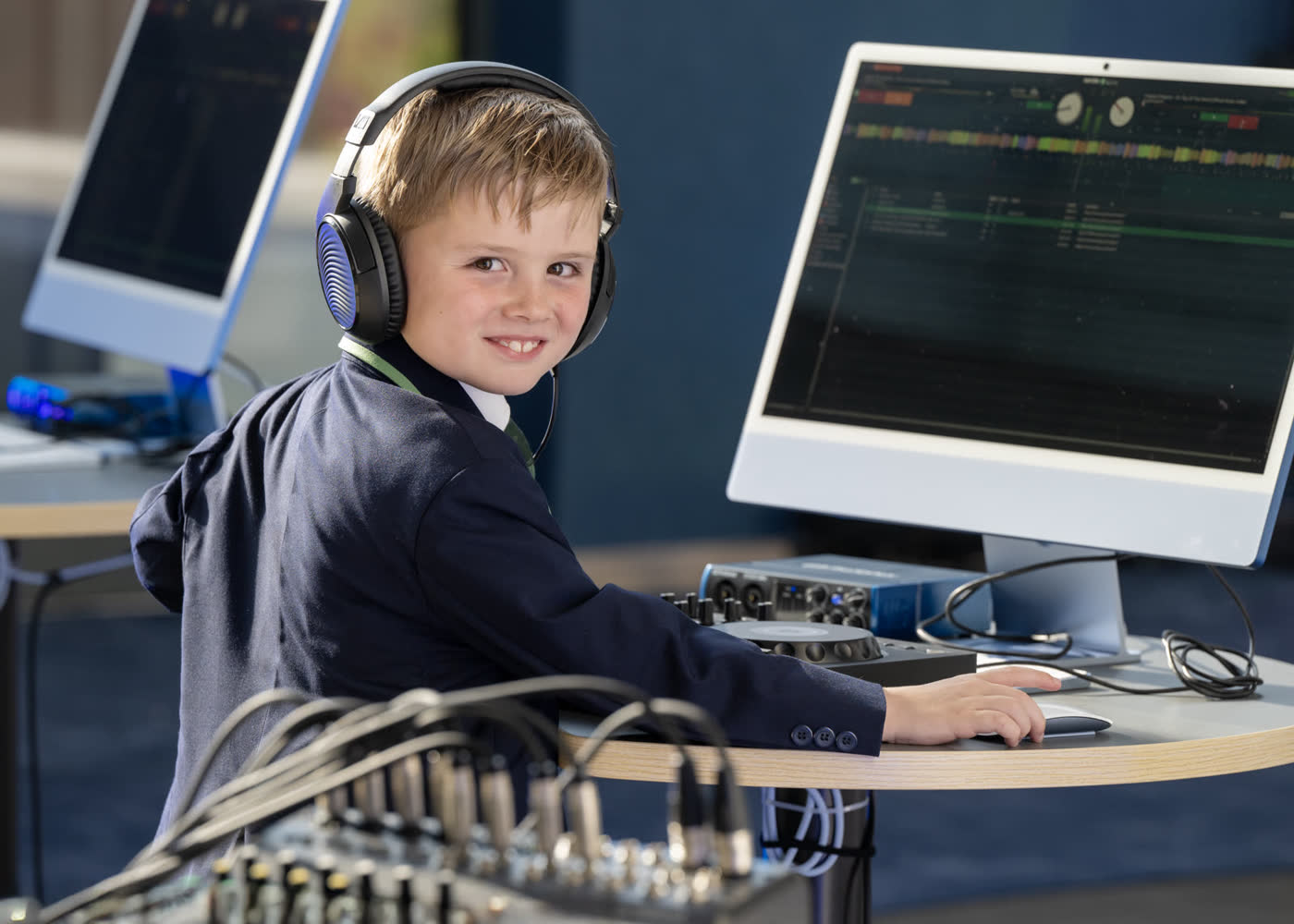 Students applying AI, robotics and design thinking