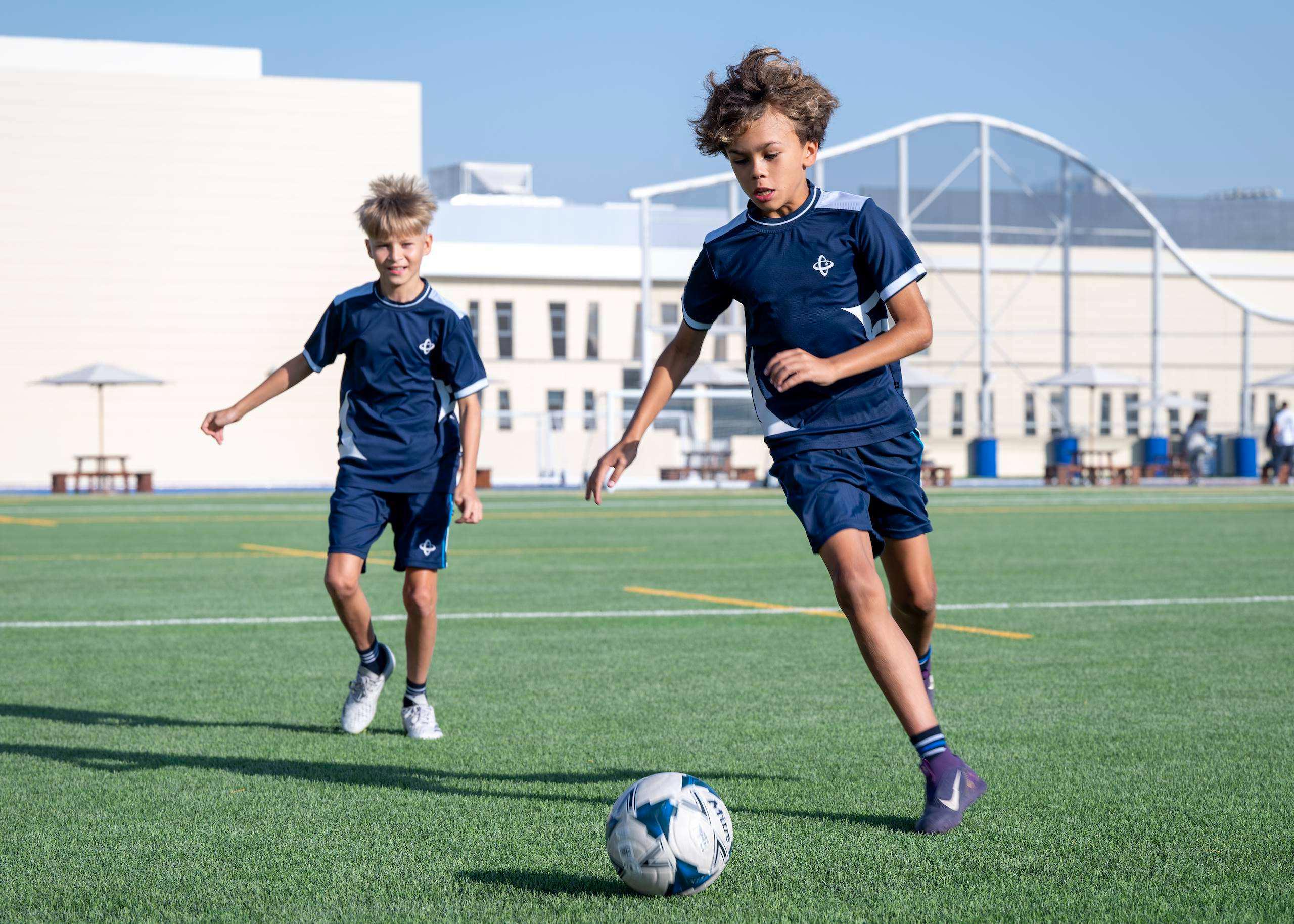 Students training in Olympic-standard sports facilities at GEMS SRI